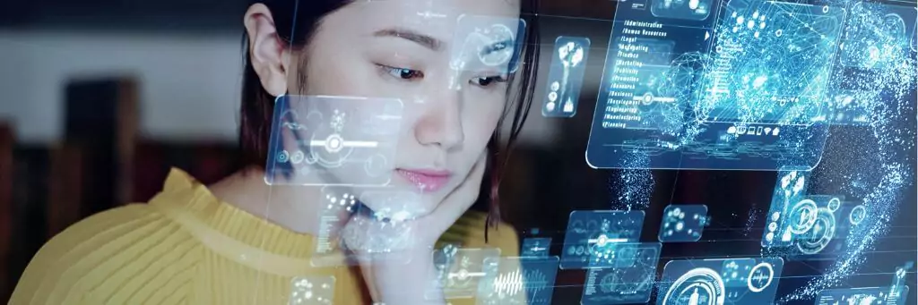 moça vendo tela com símbolos digitais